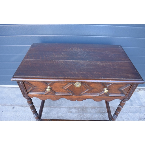 431 - A late 19th century / early 20th century oak side table with single frieze drawer and carved decorat... 