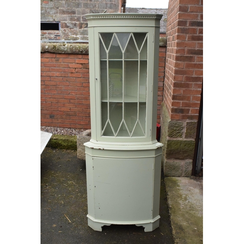 432 - A vintage wooden corner cabinet with glazed door with painted duck egg green decoration. 181cm tall.... 