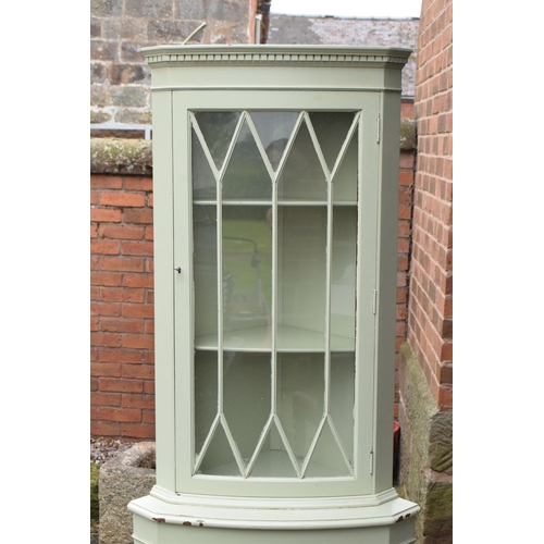 432 - A vintage wooden corner cabinet with glazed door with painted duck egg green decoration. 181cm tall.... 