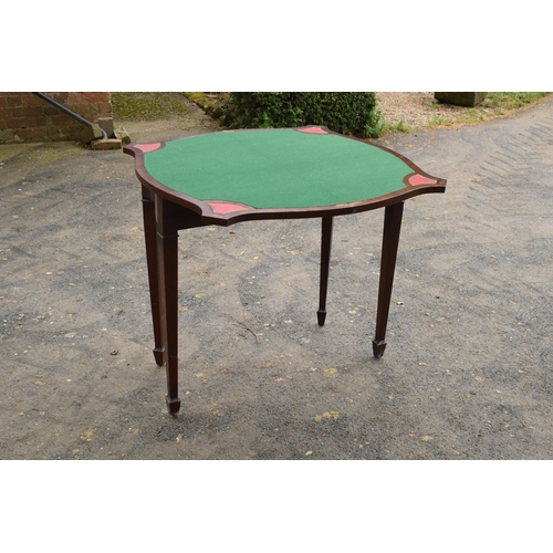 433 - A reproduction folding card table with green felt table and red leather insets. 80cm tall. 88cm when... 