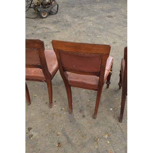 434 - A collection of late 19th / early 20th century wooden and leather chairs (4). 89cm tall. Generally o... 