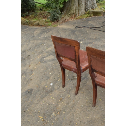 434 - A collection of late 19th / early 20th century wooden and leather chairs (4). 89cm tall. Generally o... 