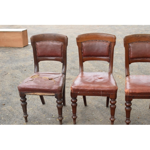 434 - A collection of late 19th / early 20th century wooden and leather chairs (4). 89cm tall. Generally o... 