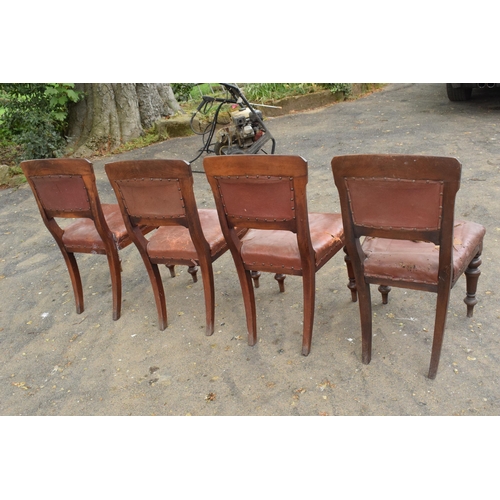 434 - A collection of late 19th / early 20th century wooden and leather chairs (4). 89cm tall. Generally o... 