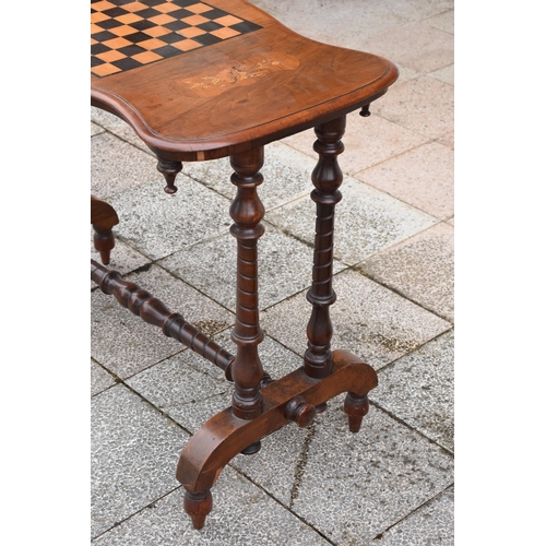 436 - Victorian walnut games table with inlaid decoration for a chessboard on turned supports. 89 x 44 x 7... 