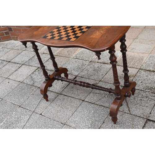 436 - Victorian walnut games table with inlaid decoration for a chessboard on turned supports. 89 x 44 x 7... 