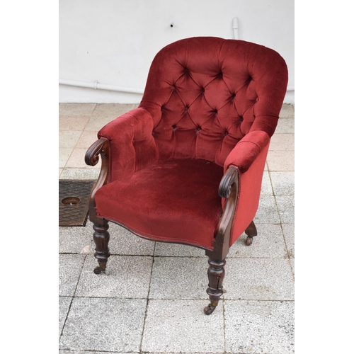 437 - A Victorian mahogany upholstered library chair. 92cm tall. In good condition.