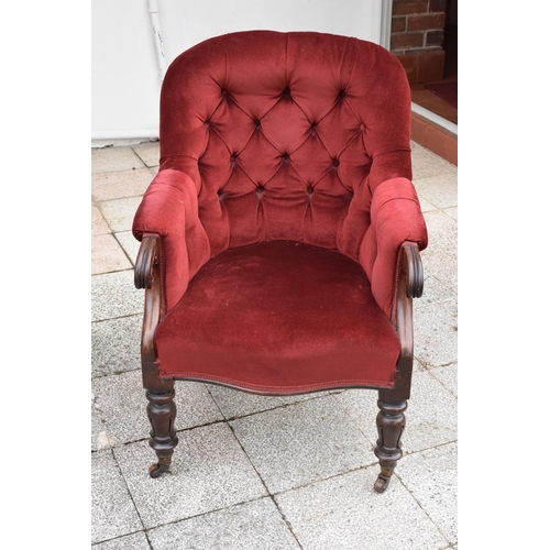 437 - A Victorian mahogany upholstered library chair. 92cm tall. In good condition.