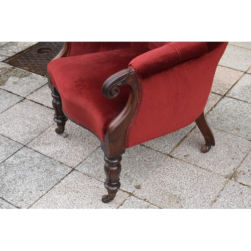 437 - A Victorian mahogany upholstered library chair. 92cm tall. In good condition.