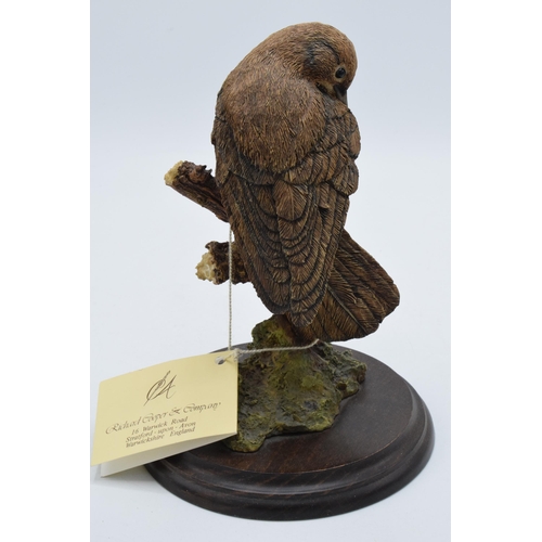 35F - Boxed Country Artists model of a bird perched on a branch and foliage.  In good condition with no ob... 