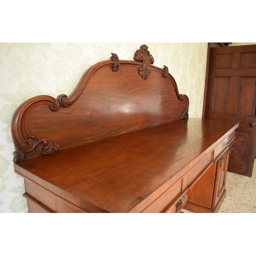 247C - 19th century figured mahogany twin pedestal buffet sideboard with raised back with carved detail. 21... 