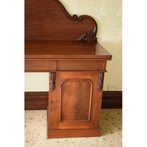 247C - 19th century figured mahogany twin pedestal buffet sideboard with raised back with carved detail. 21... 