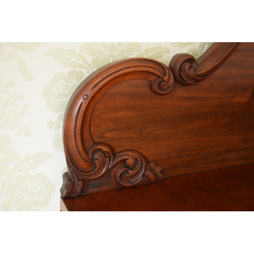 247C - 19th century figured mahogany twin pedestal buffet sideboard with raised back with carved detail. 21... 