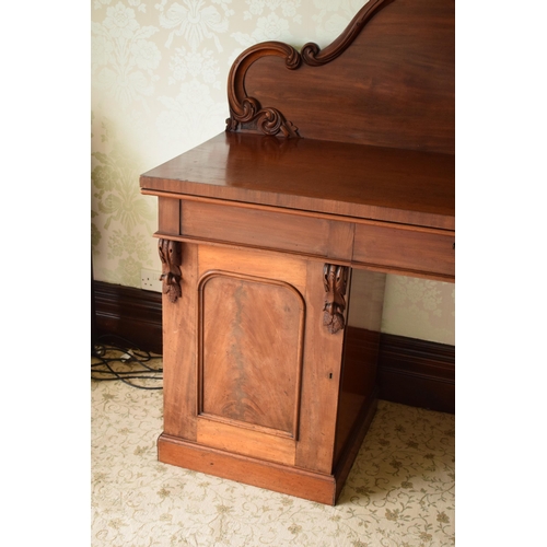 247C - 19th century figured mahogany twin pedestal buffet sideboard with raised back with carved detail. 21... 