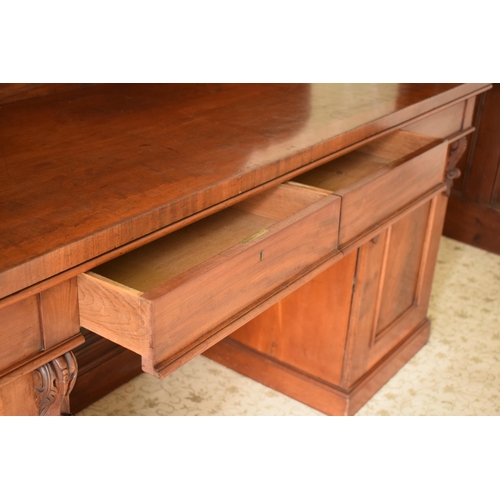 247C - 19th century figured mahogany twin pedestal buffet sideboard with raised back with carved detail. 21... 