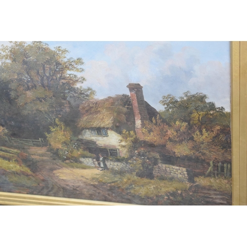 247D - A 19th century oil on canvas in a gilt frame showing a countryside scene with a couple of figures in... 