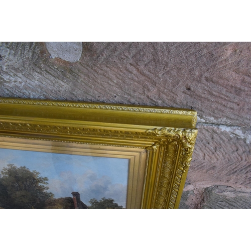 247D - A 19th century oil on canvas in a gilt frame showing a countryside scene with a couple of figures in... 