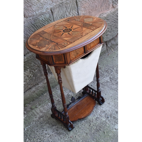 247E - An early 20th century sewing table with marquetry decoration in the Aesthetic Movement style with re... 