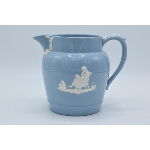 101 - Wedgwood Queensware large jug with traditional scenes, 15.5cm tall.