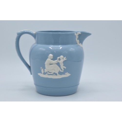 101 - Wedgwood Queensware large jug with traditional scenes, 15.5cm tall.