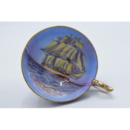 107 - Aynsley Fine Bone China tea cup decorated with a sailing ship / galleon at sea on blue background.