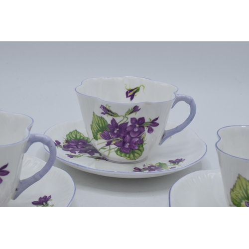 110 - A trio of Shelley duos 'Violets' pattern 13821 to include 3 cups and 3 saucers (6).