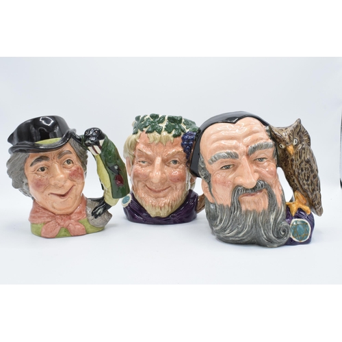 118 - A trio of boxed large Royal Doulton character jugs to include The Walrus and Carpenter D6600, Merlin... 