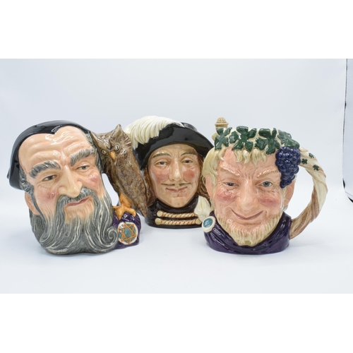 122 - A trio of boxed large Royal Doulton character jugs to include Bacchus D6499, Aramis D6441 and Merlin... 