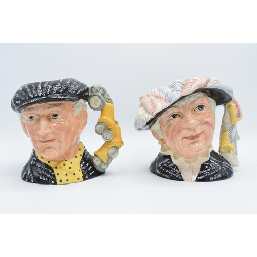 124 - A pair of boxed large Royal Doulton character jugs to include Pearly King D6760 and Pearly Queen D67... 