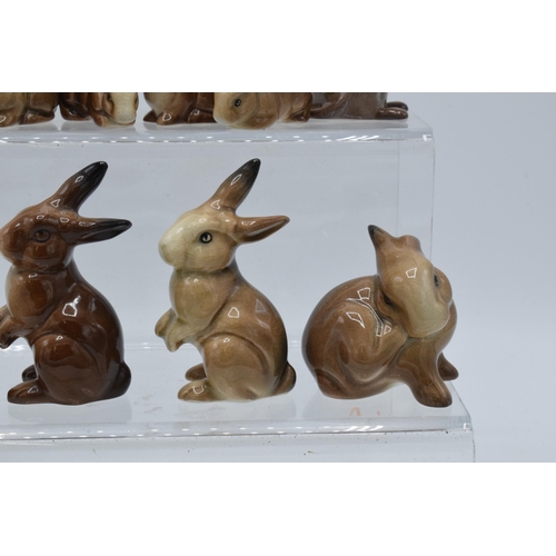 127 - A collection of Beswick animals to include rabbit families and two mice (10).