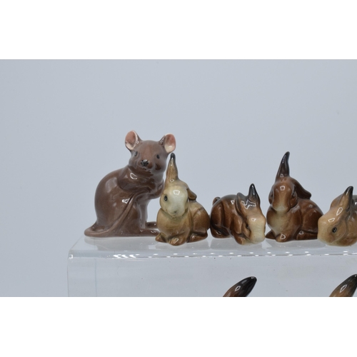 127 - A collection of Beswick animals to include rabbit families and two mice (10).