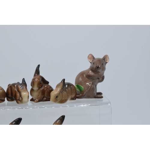 127 - A collection of Beswick animals to include rabbit families and two mice (10).