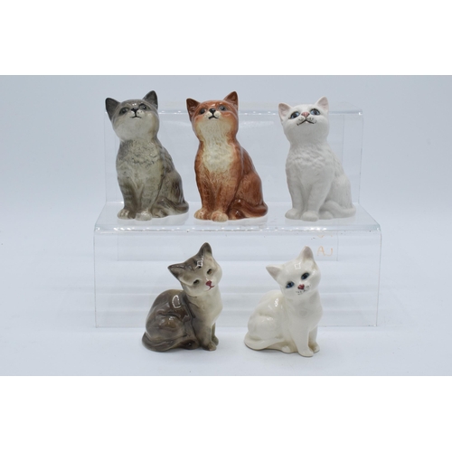 130 - A collection of Beswick cats and kittens to include 1886 in matte white, ginger and grey together wi... 