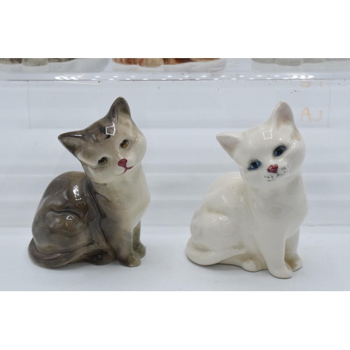 130 - A collection of Beswick cats and kittens to include 1886 in matte white, ginger and grey together wi... 