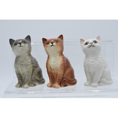 130 - A collection of Beswick cats and kittens to include 1886 in matte white, ginger and grey together wi... 