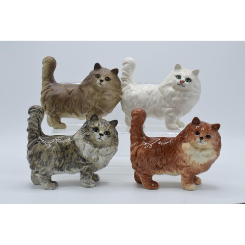 131 - A collection of Beswick 1898 cats in a grey colourway together with white, ginger and matte grey exa... 