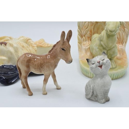 132 - A collection of Beswick to include Sealyham Terrier wall plaque 301, Beswick Ware rabbit bookend 455... 