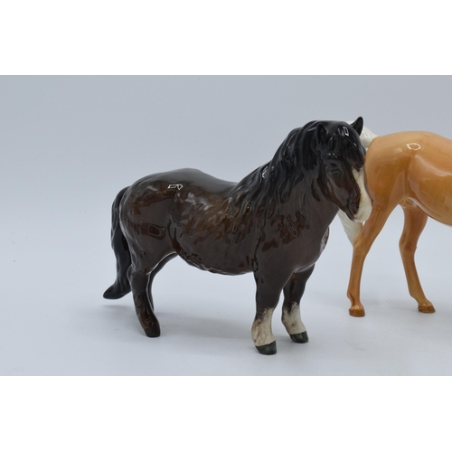 138 - Beswick Shetland pony 1033 together with palomino Arab Xayal 1265 (2).