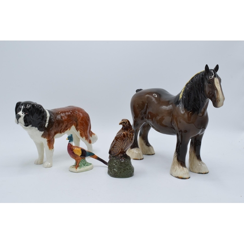 140A - A collection of Beswick to include St Bernard dog, brown 818 shire (ear chipped), pheasant and whisk... 