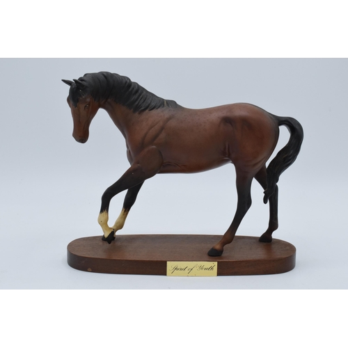 145 - Beswick matte brown Spirit of Youth on wooden base