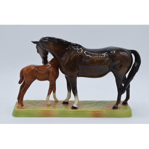 161 - Beswick brown mare and chestnut foal on ceramic base 1811