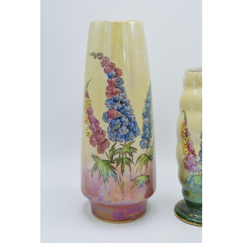 172 - A pair of Royal Winton vases painted with foxgloves on a lemon yellow background, one with ribbed sh... 