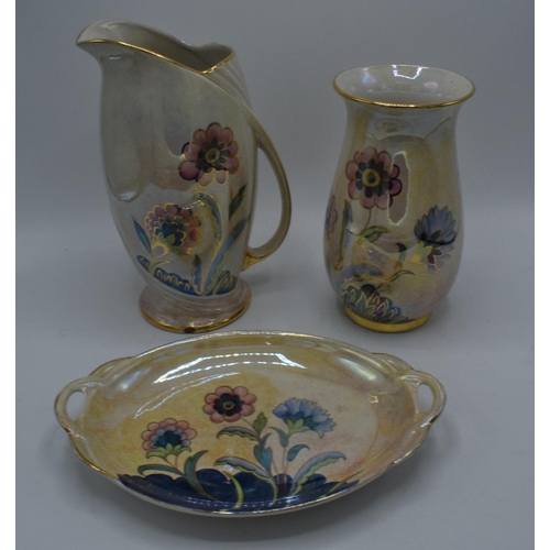 175 - A trio of Royal Winton Grimwades items with a floral design on light coloured background to include ... 