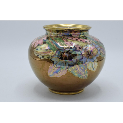 176 - Royal Winton Grimwades lustre ovoid vase with floral decoration. 16cm wide.