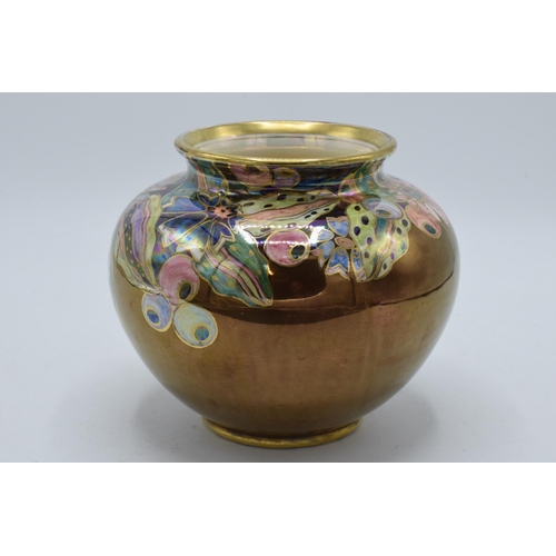 176 - Royal Winton Grimwades lustre ovoid vase with floral decoration. 16cm wide.