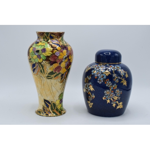 178 - Royal Winton Grimwades floral and gilt ginger jar on dark blue background together with floral vase ... 