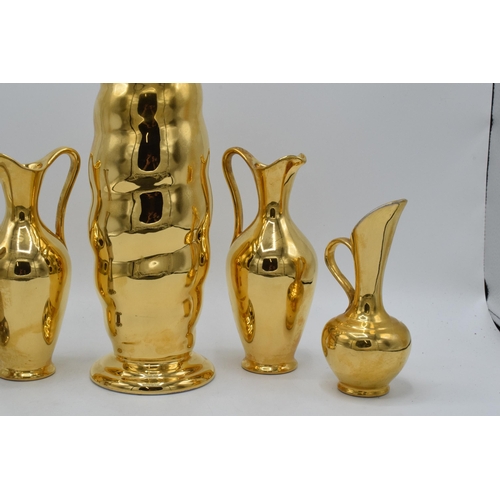 179 - A collection of Royal Winton Grimwades jugs and vases in gold and silver lustres (5). Tallest 26cm t... 