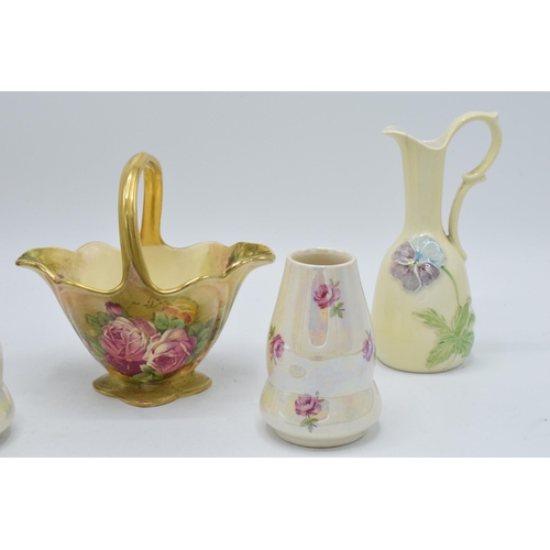 181 - A collection of Royal Winton Grimwades to include a floral posy basket, vases, jugs etc (6).