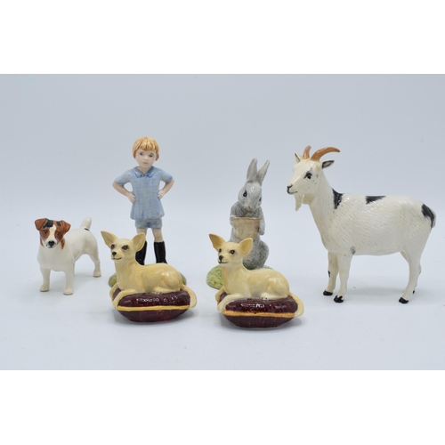 188 - A collection of pottery to include Beswick chihuahua on cushion x 2, Jack Russell and Royal Doulton ... 