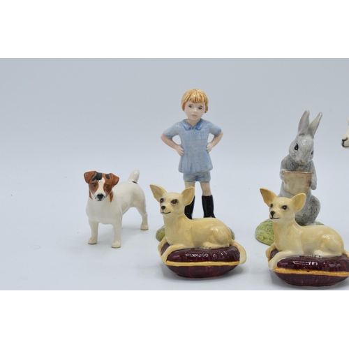 188 - A collection of pottery to include Beswick chihuahua on cushion x 2, Jack Russell and Royal Doulton ... 